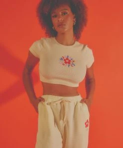 Vacancy Supply X Micke Lindebergh - Blume Baby Tee - Buttercream New & Most Loved